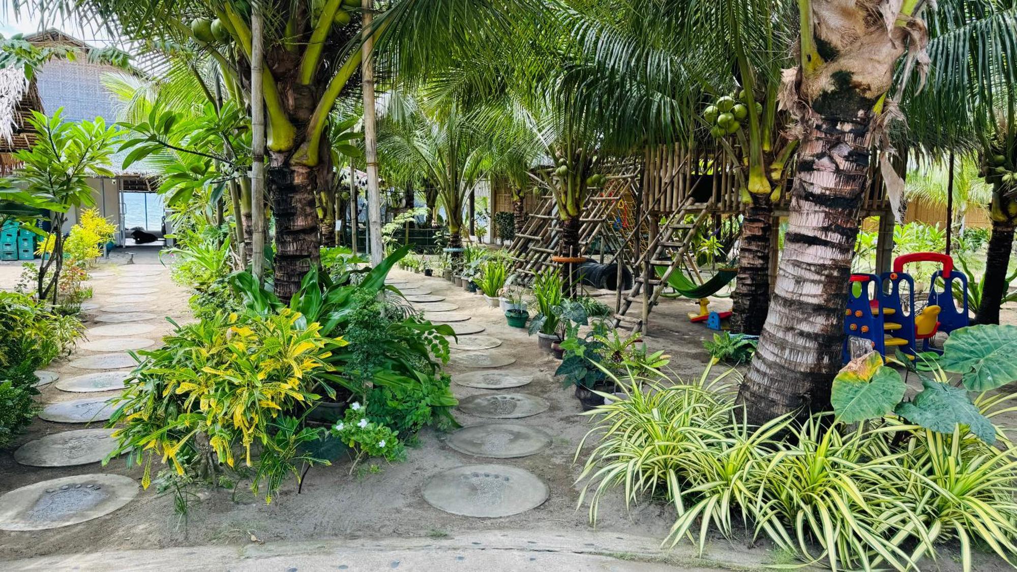 Footprints Beach Resort Agpudlos Bagian luar foto